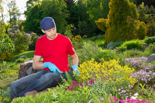 Team briefing and safety planning in a garden